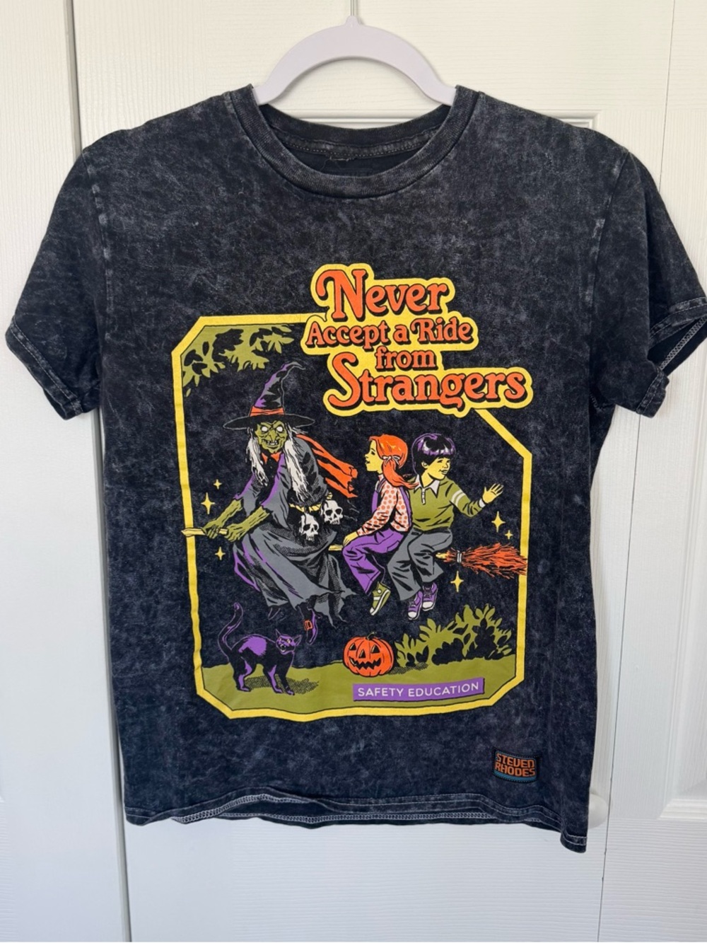 Steven Rhodes “Never Accept a Ride From Strangers” Graphic Tee - Black SMALL